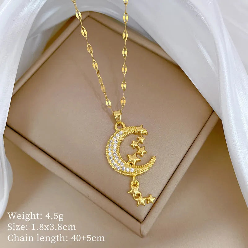 Moon tassel necklace with geometric full diamond copper pendant on stainless steel chain.
