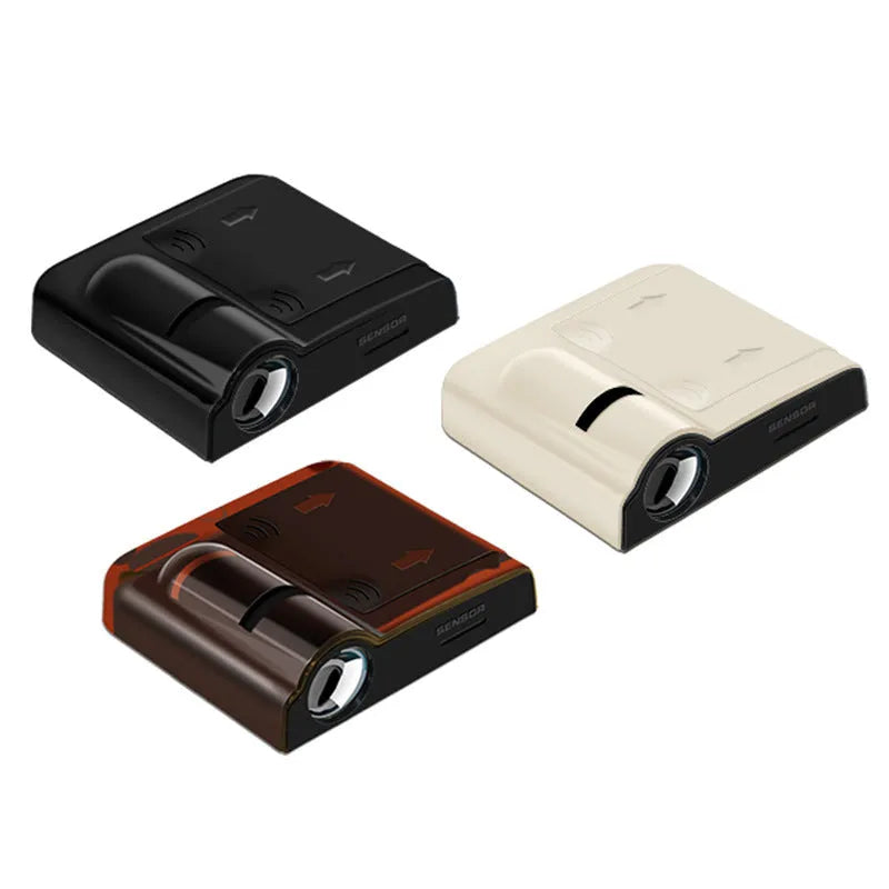 Compact black or beige ABS plastic car decorative projection radium lamp with battery compartment.