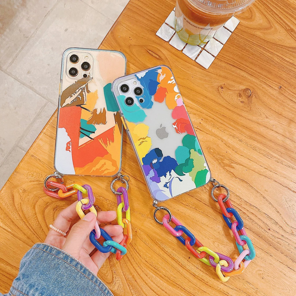 Personalised graffiti design TPU mobile phone case with a detachable wrist bracelet attached.