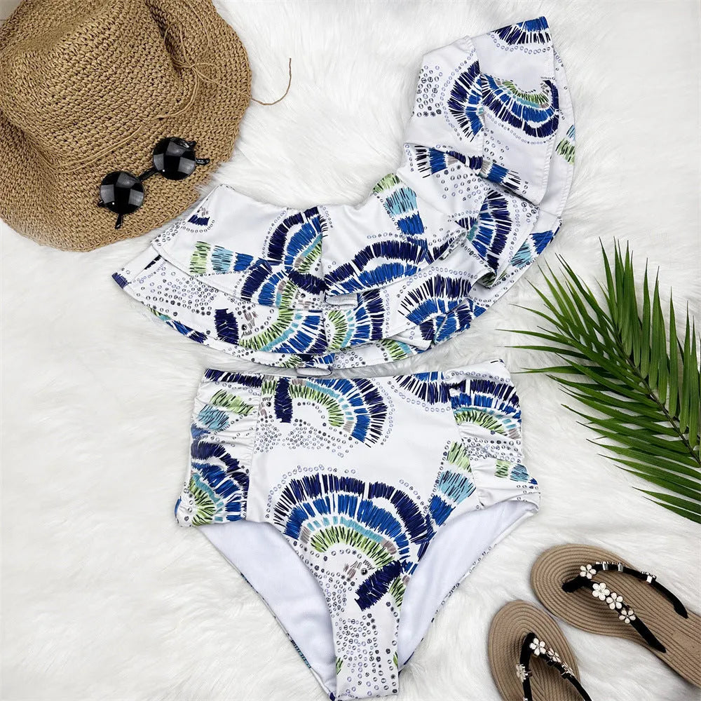 White one-shoulder women's swimsuit with a double-layer lotus leaf split skirt.