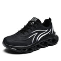 Men's Korean style carved wing pattern net cloth casual running shoes with foam sole, available in black and white colour options