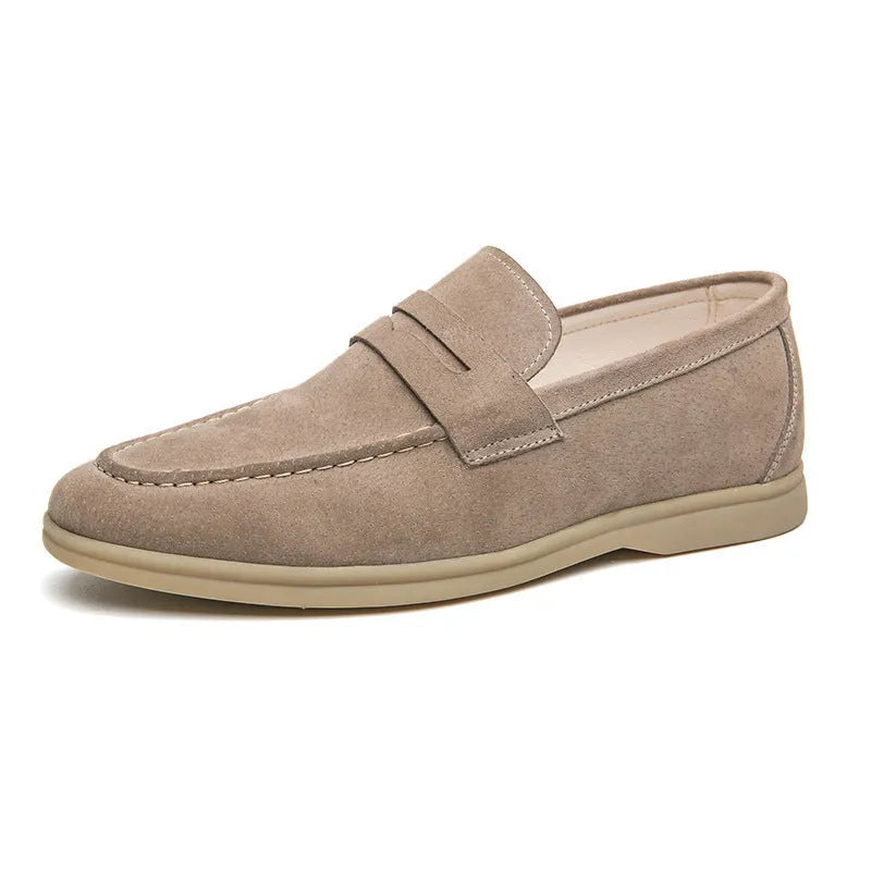 Men's black slip-on leather shoes with oversleeve design and rubber sole.