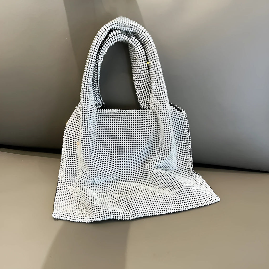 Silver cotton thread party handbag with rhinestone detailing and open outer pocket