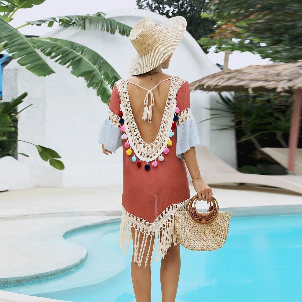 Orange hand-crocheted bamboo cotton beach overskirt with tassel trim and matching floral blouse