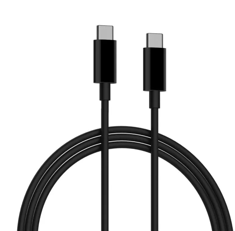 Black ZMI USB-C 65W GaN laptop power adapter showing compact size