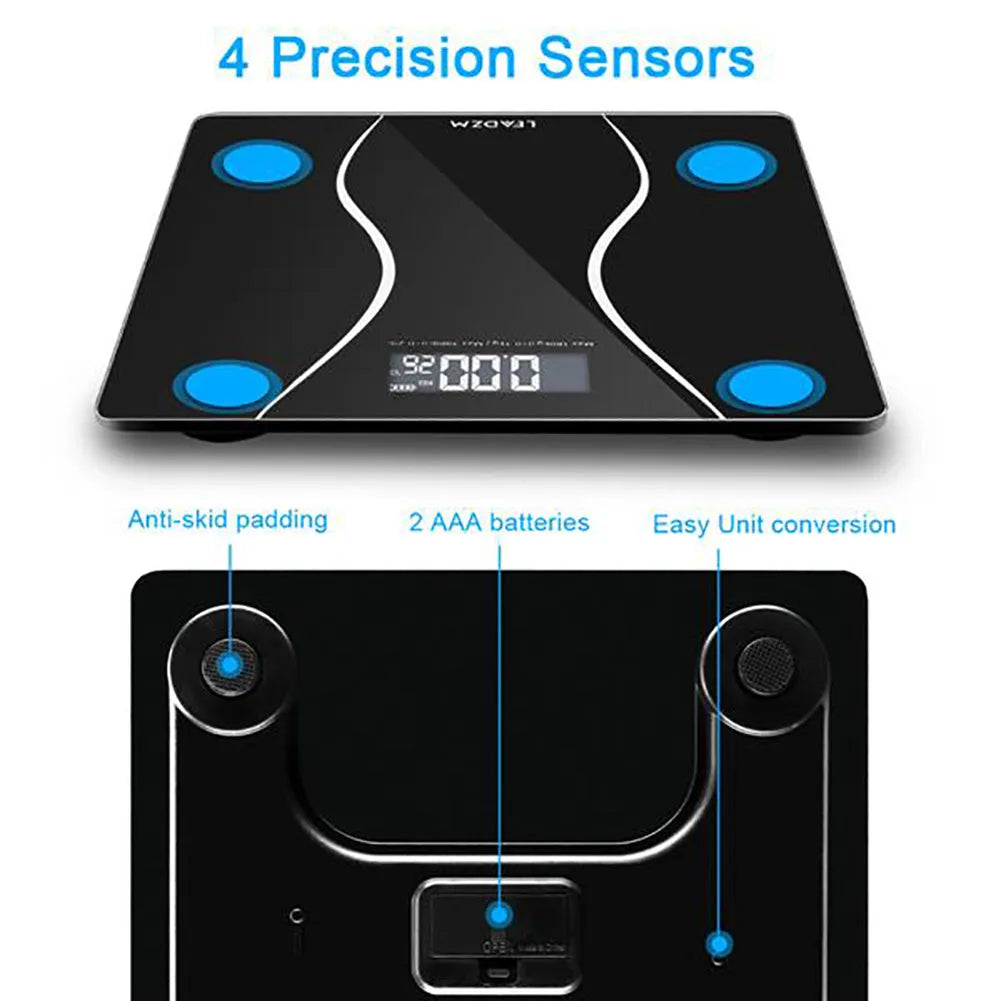 Black electronic body scale with LCD display showing weight measurement up to 180kg