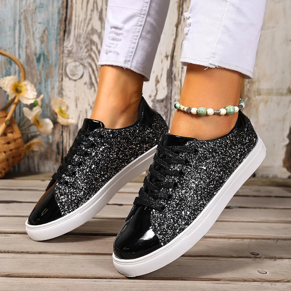 Women's plus size board shoes with front lace-up closure and flat heel in black colour