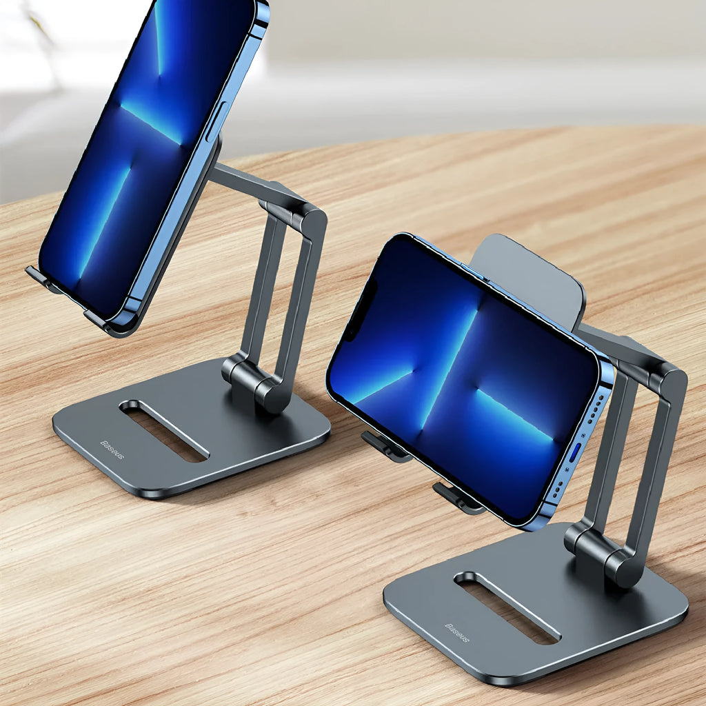 Deep space grey aluminium folding stand holding a tablet and a mobile phone.