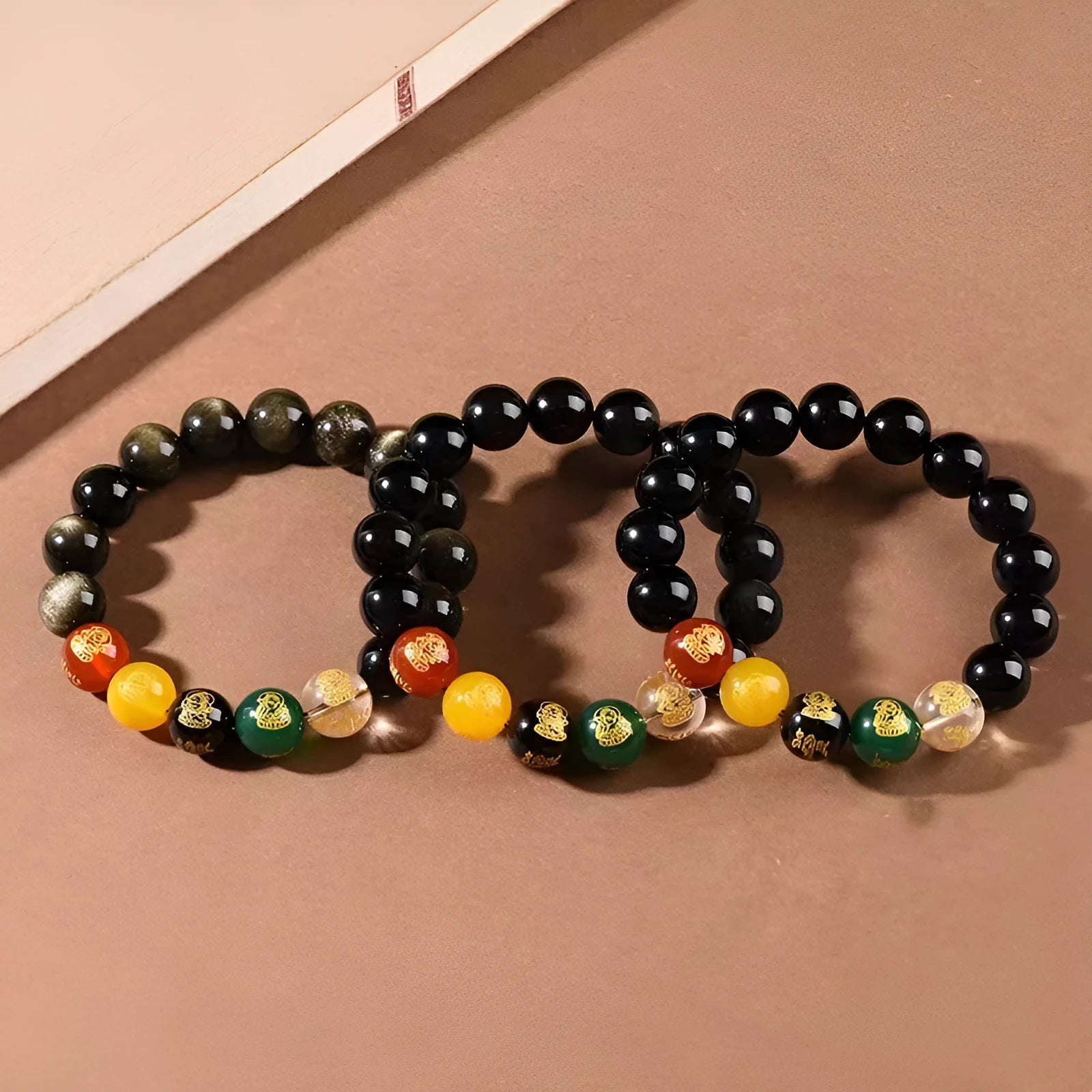 Rainbow eye obsidian and gold obsidian crystal bracelet with zodiac motifs in new Chinese style