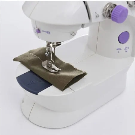 Miniature electric household sewing machine measuring 20 x 15 x 10 cm with straight stitch cylinder