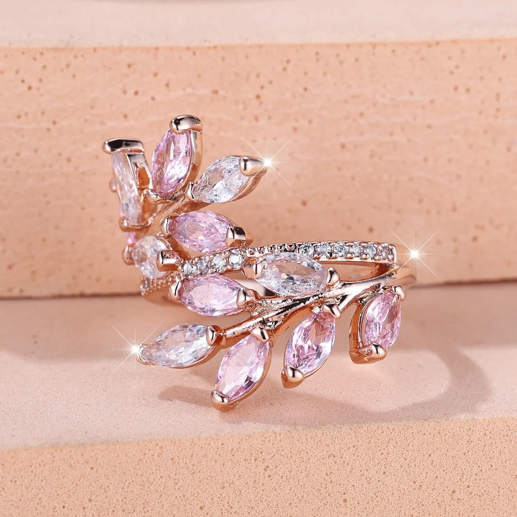 Adjustable copper leaf ring with a horse eye zircon stone in a choice of nine colour finishes.