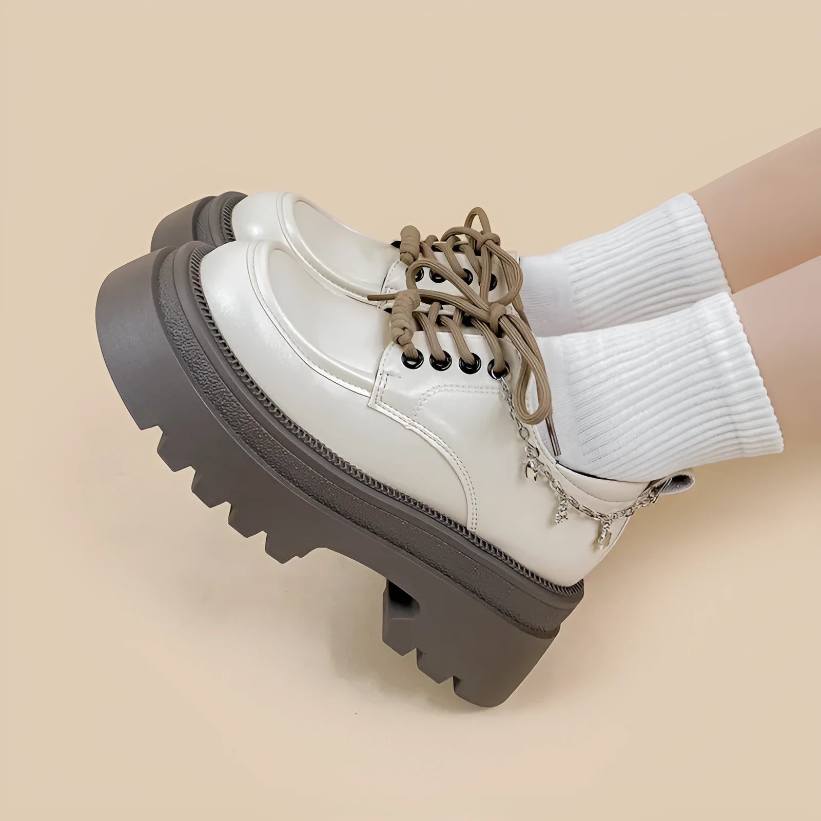 White women's platform Mary Jane shoes with round toe, front lace-up, and a chunky heel