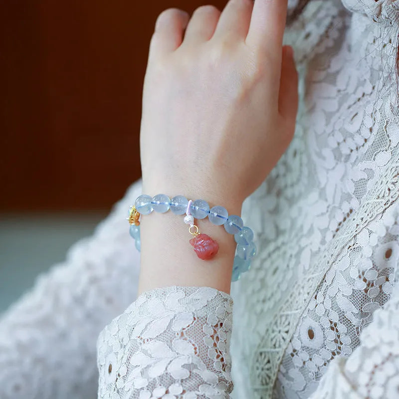 Aquamarine Chinese Fengjiu style bracelet with fox design and pink crystal accents for women