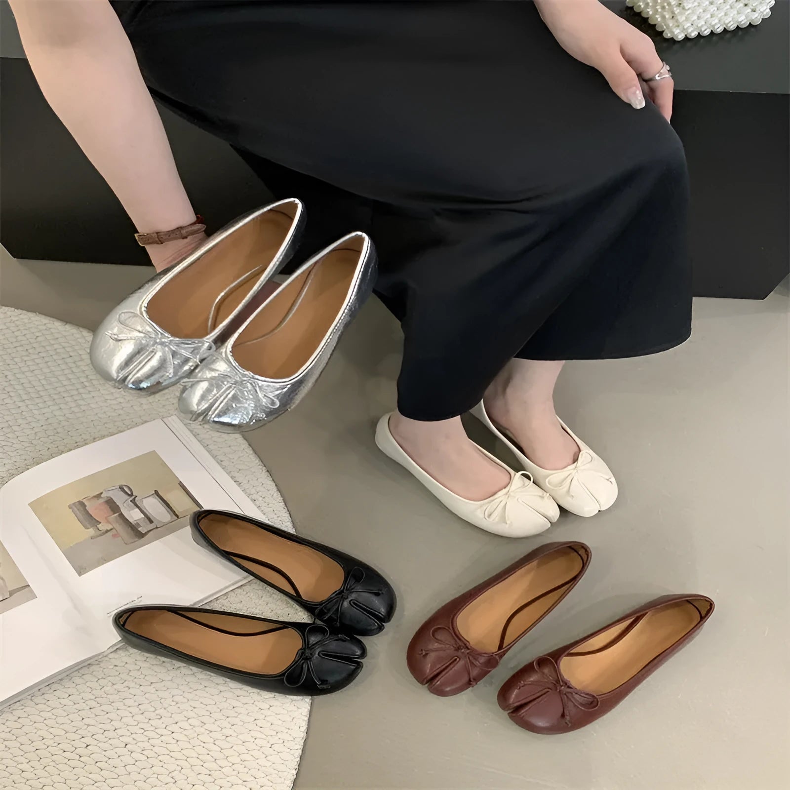 Women's black split-toe flat pump shoes with round toe and rubber sole