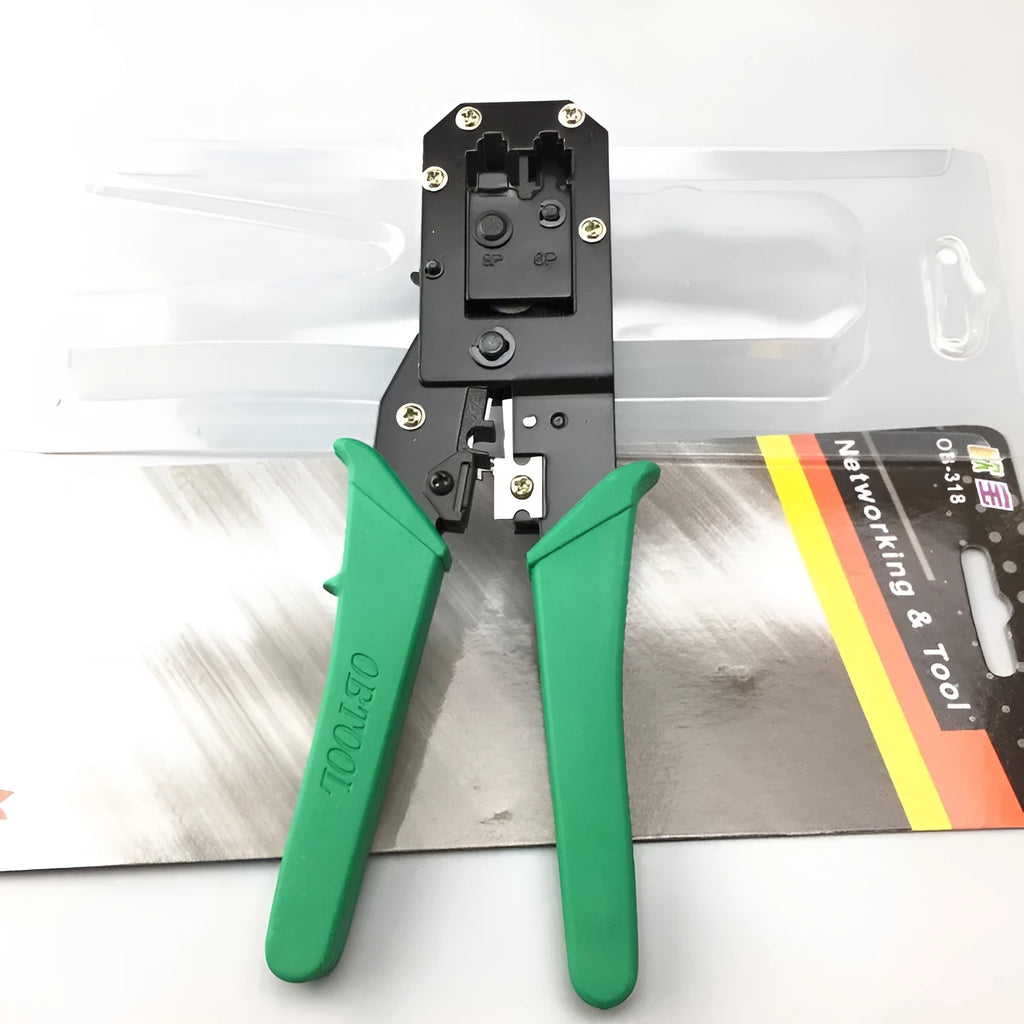 Green dual-purpose crystal head net pliers with tool steel jaws and plastic handle on plain background