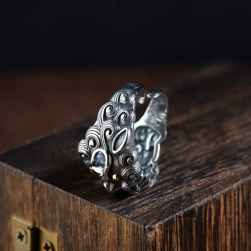 Silver open ring with Jibeast pattern animal zodiac design and adjustable sizing