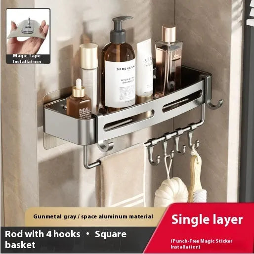 Gun grey triangle bathroom storage rack mounted in corner with towels and toiletries