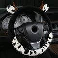 Short plush steering wheel cover with protective handle section in black colour