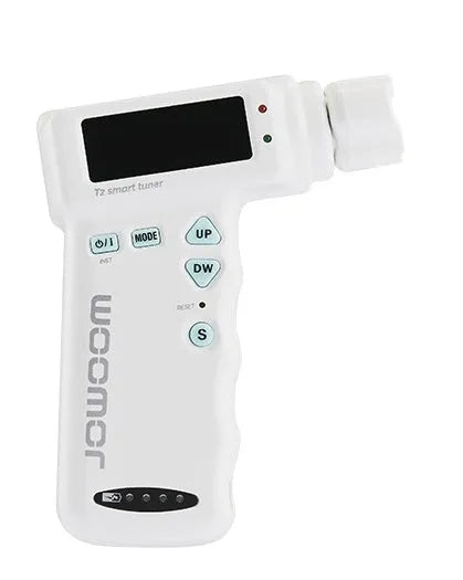 Black and white smart guitar tuner and string winder with colourful LCD display