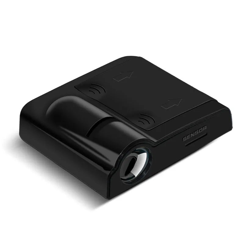 Compact black or beige ABS plastic car decorative projection radium lamp with battery compartment.
