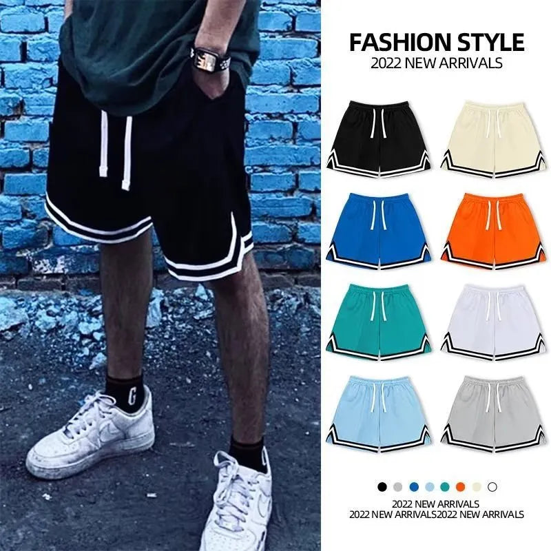 Men's loose fit polyester summer shorts in various colours with an elastic waistband.