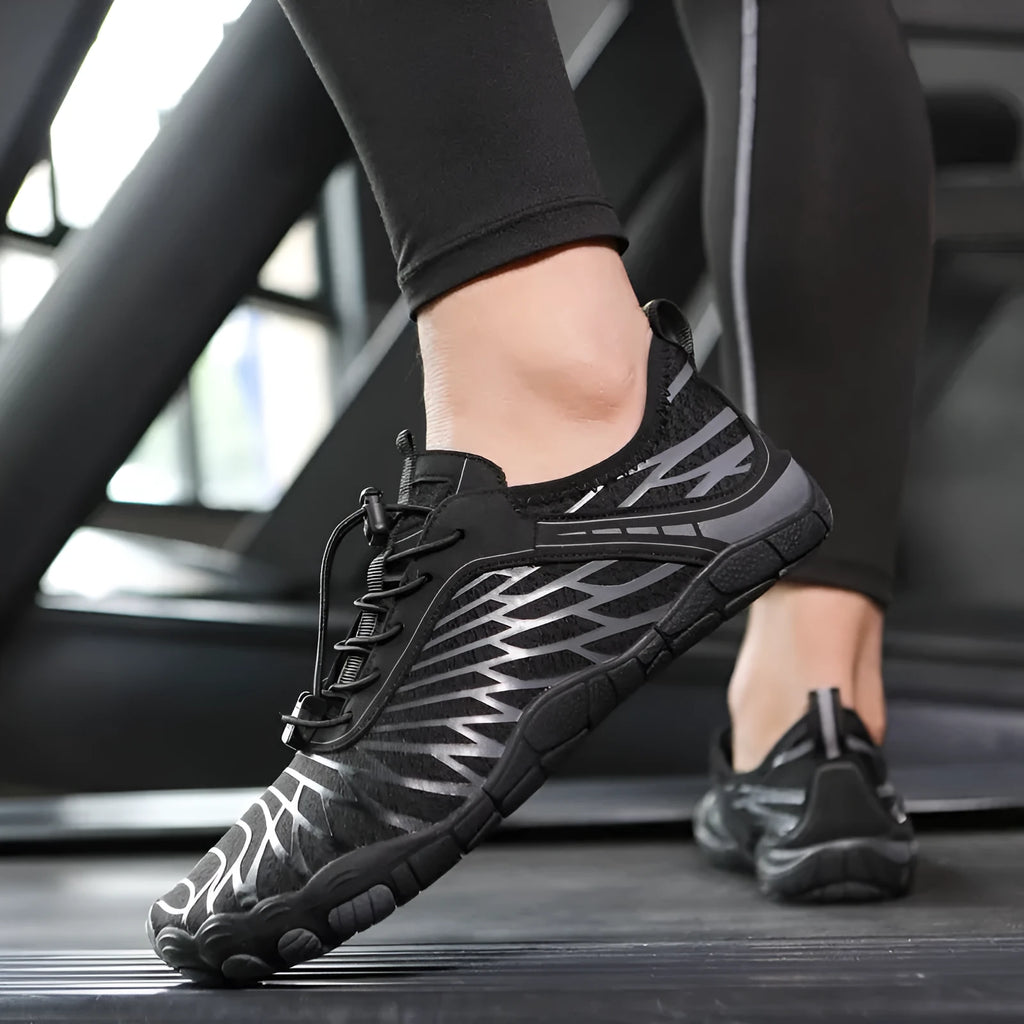 White breathable lace-up casual sports shoes with a non-slip rubber sole on a plain background.