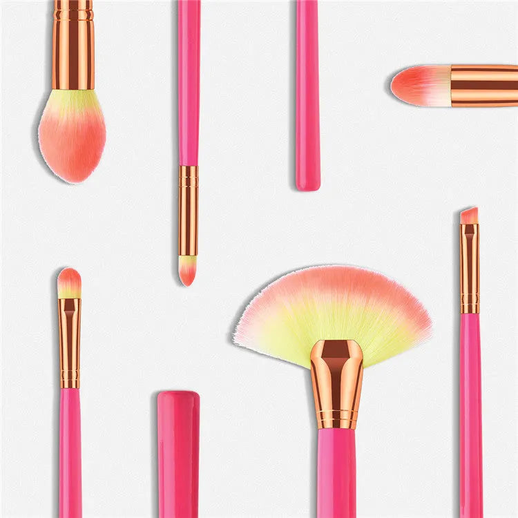 Pink wooden handle synthetic bristle makeup brush set in a compact case