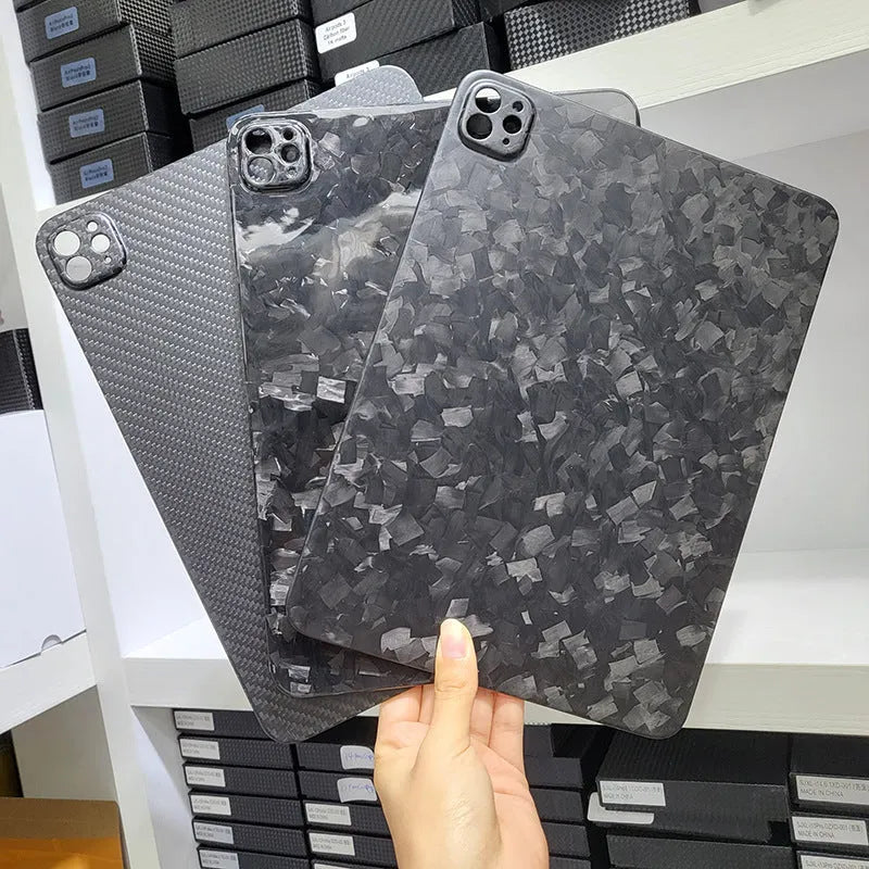 Flat carbon fibre hard protective case for Apple iPad Pro 11 tablet in a textured finish.