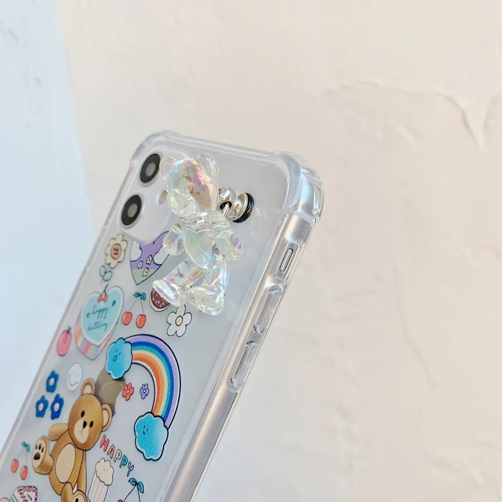Clear TPU iPhone case with an attached bear chain and cartoon pendant charm
