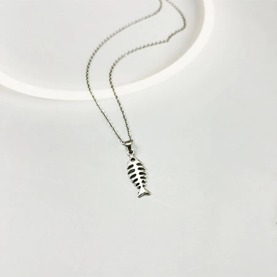 A pair of retro-style alloy earrings with a fishbone pendant hanging from an O-shaped chain.
