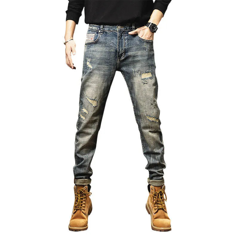 Man wearing vintage blue loose-fit jeans with a fleece lining and drawstring waist.