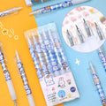 Six animal-themed press pen knives showing bear and rabbit designs with plastic bodies and metal blades
