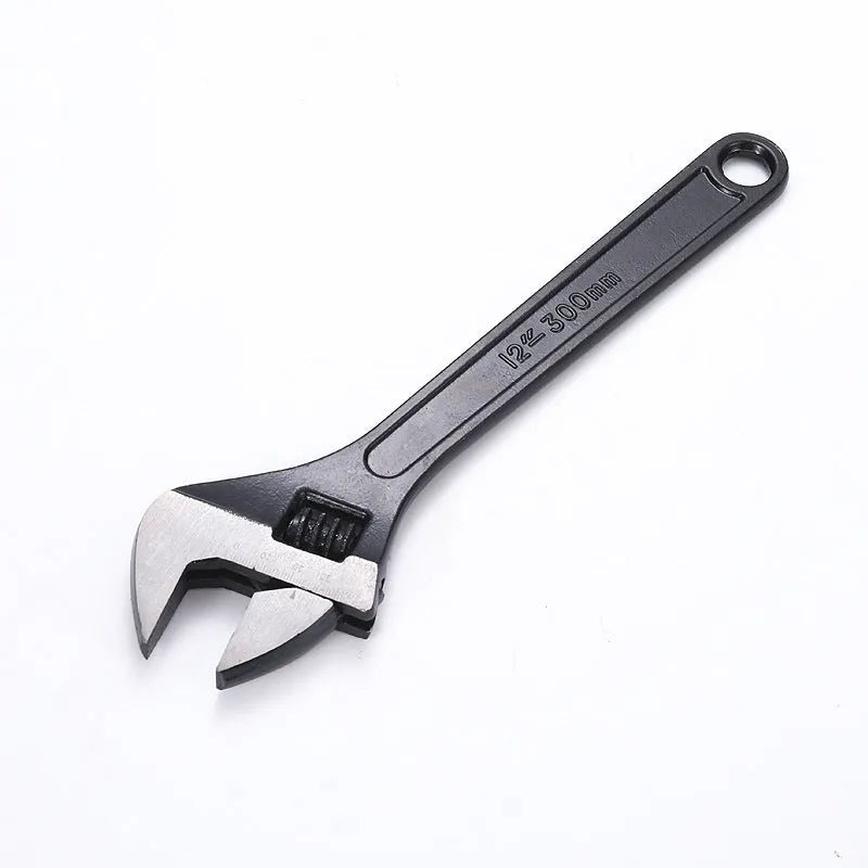 10-inch black high carbon steel adjustable open-end wrench on a workbench