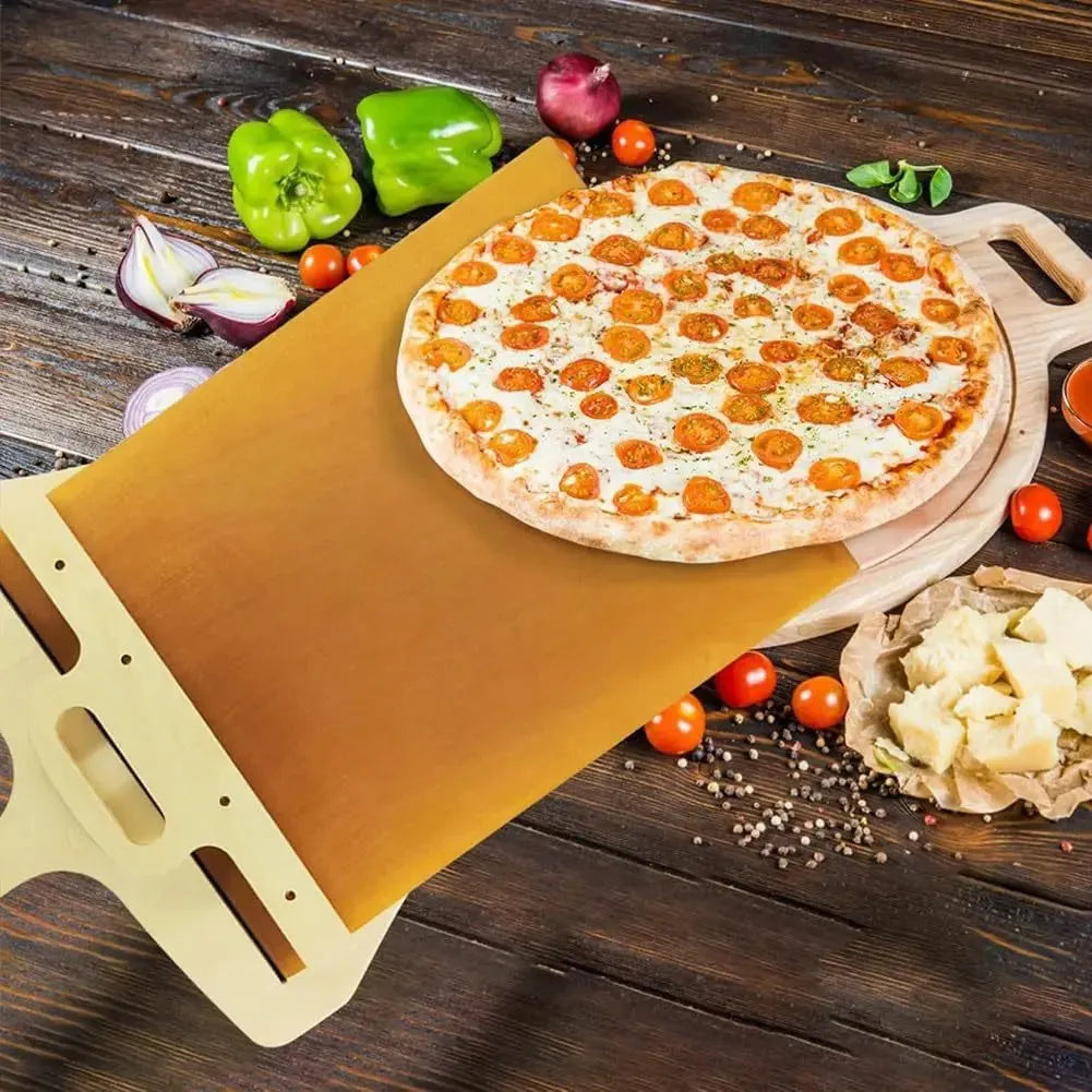 Wooden pizza transfer shovel with cutting board surface and hanging hole