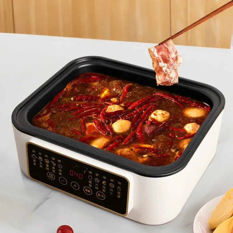 28 litre capacity electric kitchen steamer with stainless steel rack on a worktop.