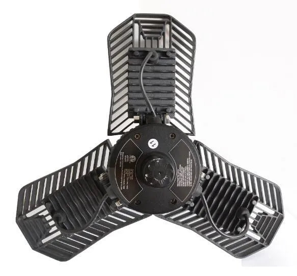 Waterproof industrial foldable garage lamp with aluminium body on a black mounting bracket