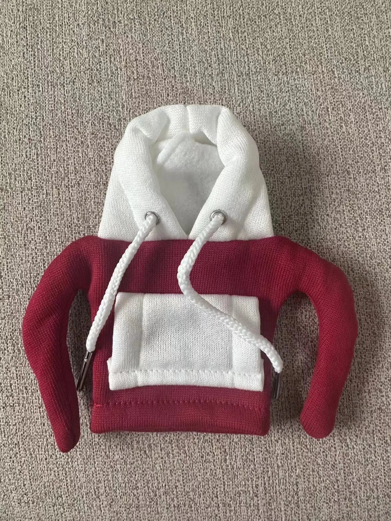 Polyester knit hood cover for car gear lever in red and white colour combination.