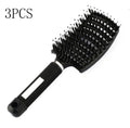 Black bristle and nylon hairbrush with arched comb head and non-slip rubber handle on white background