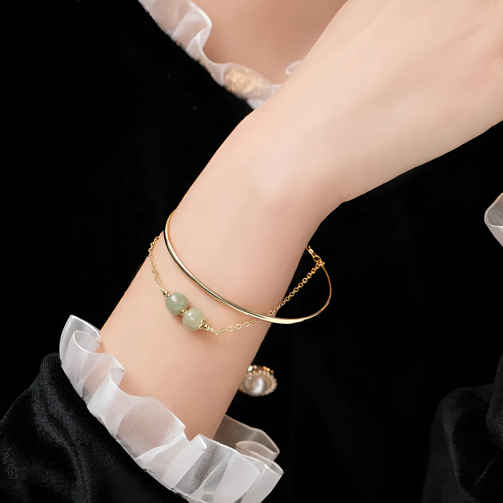 Women's jade lucky beads bracelet with gold inlay treatment showing single, double, and three beads versions