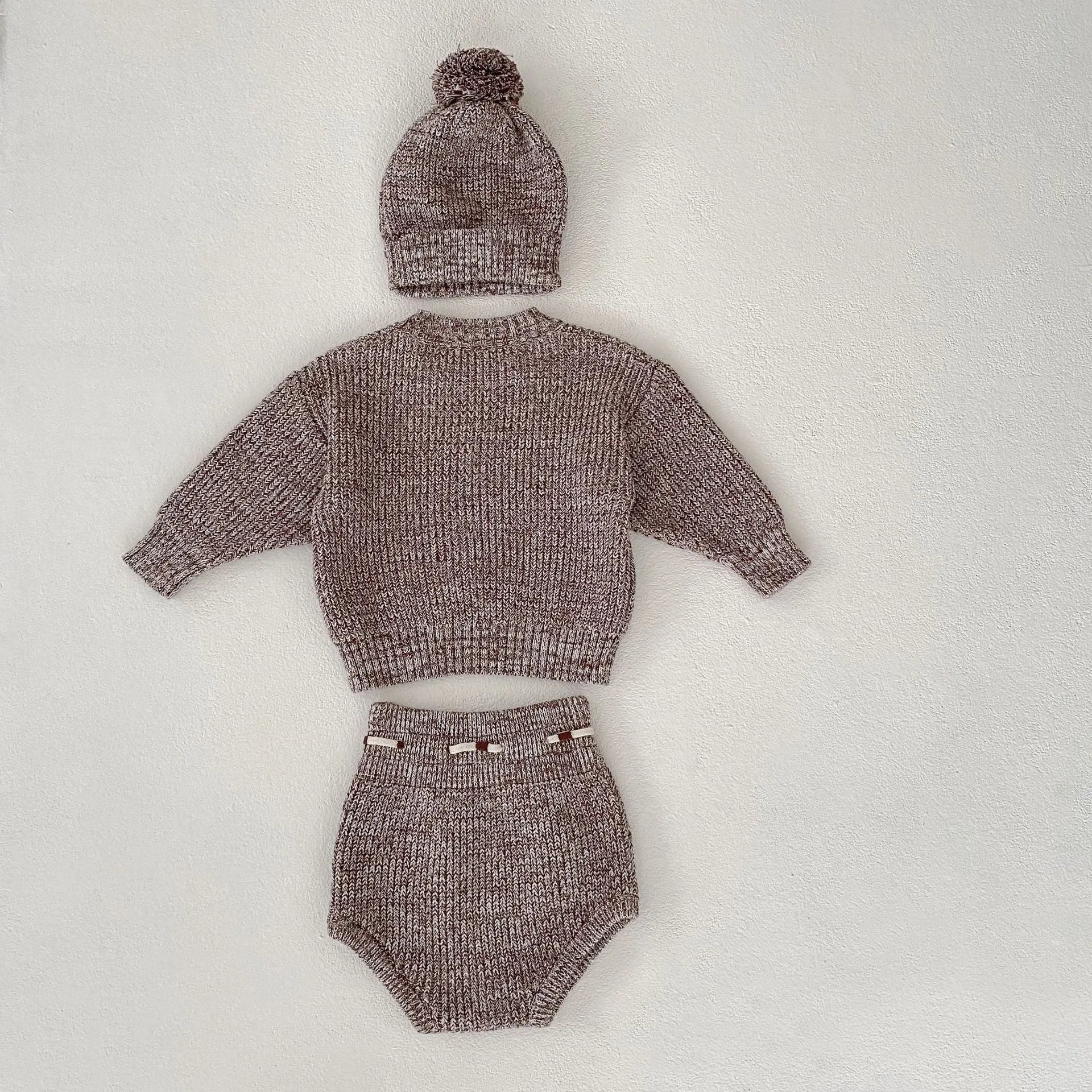 Infant girl dark brown knitted three-piece set with fur ball hat on hanger