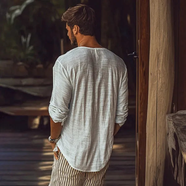 Beige slim fit V-neck long-sleeved T-shirt made from a breathable hemp blend fabric.