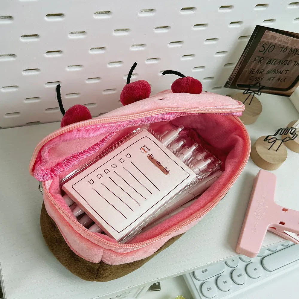 Cherry Cake coloured velvet plush pencil bag in Korean style on a surface.