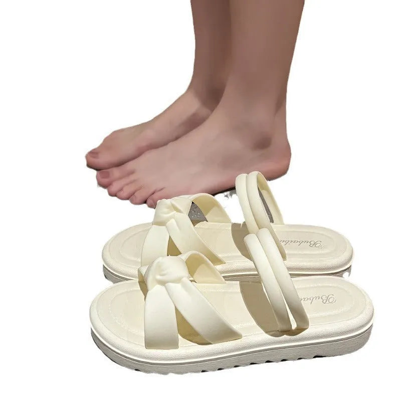 Women's black PVC outdoor sandals showing soft back thick back construction and two-way wear design