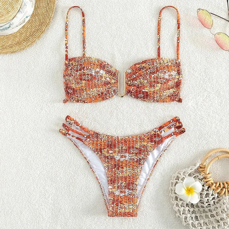 Women's floral bikini swimsuit with high-waist briefs in solid colour patterns