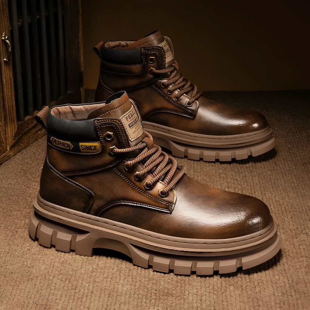 Men's brown artificial PU leather Martin boots with front laces, round toe, and mid-calf height on a rubber sole.