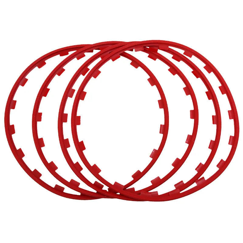 Set of four coloured nylon wheel hub protection rings for alloy wheels.