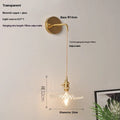 Retro copper wall lamp with a glass shade in a choice of six colours on a wall.