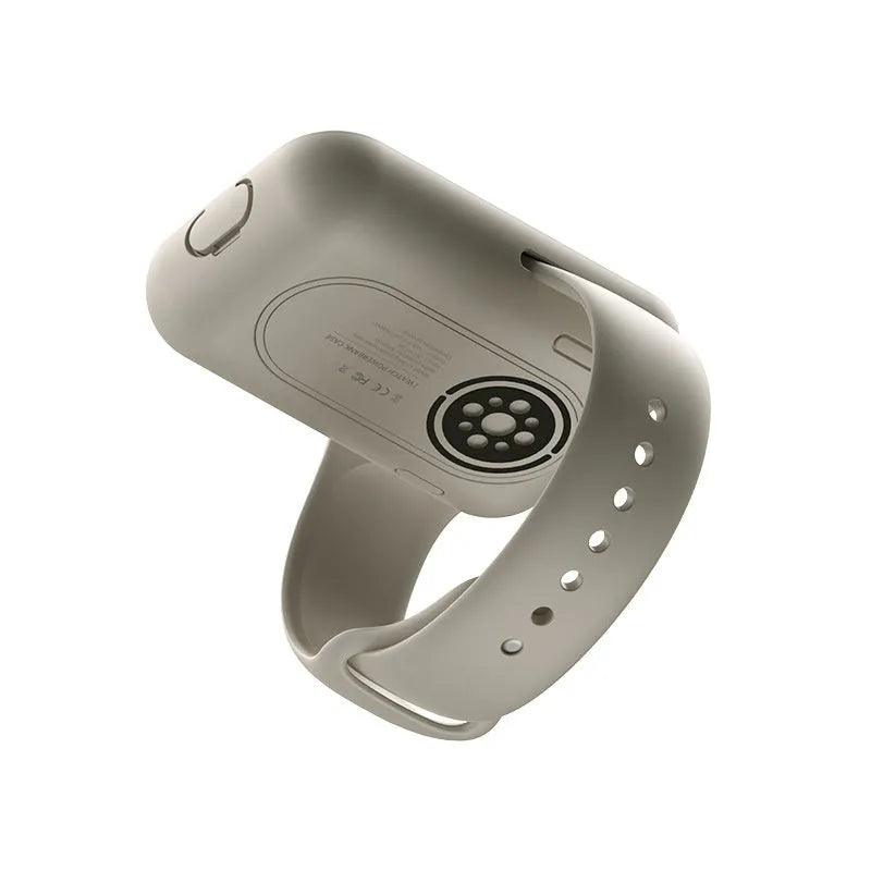 Apple Watch portable charging case with silicone cover, shown in Brown, Midnight Blue, and Starlight colours.