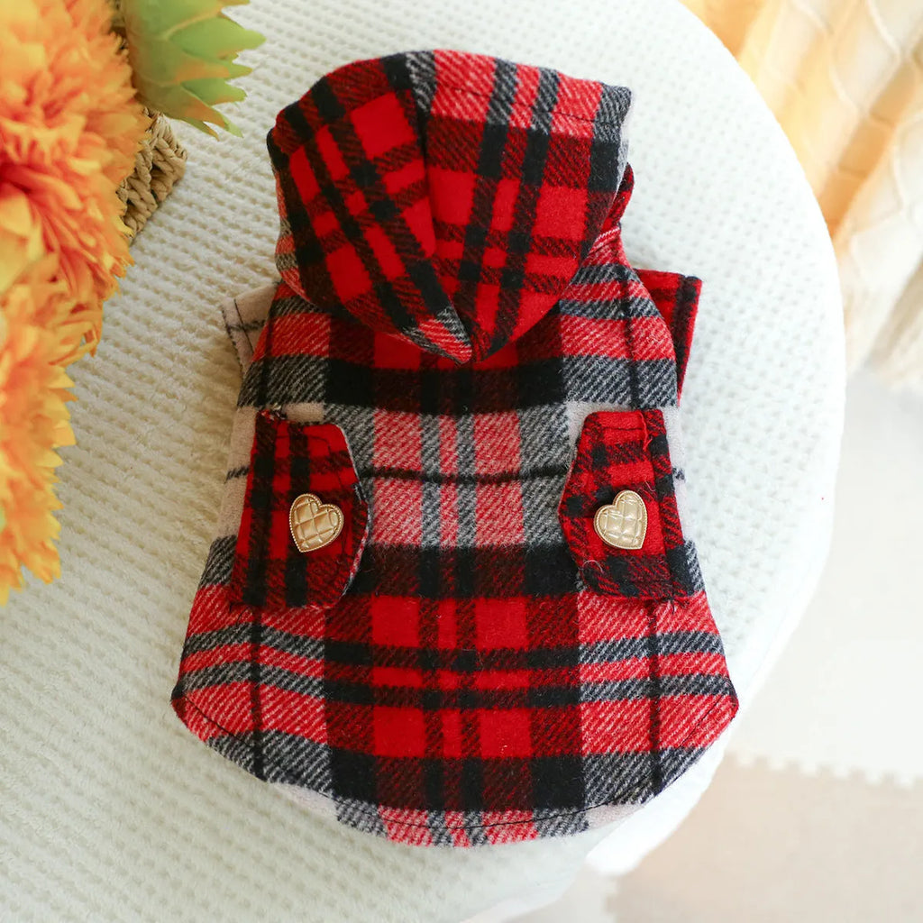 Red plaid dog trench coat shown alongside black houndstooth version, displaying five size options for pet clothing