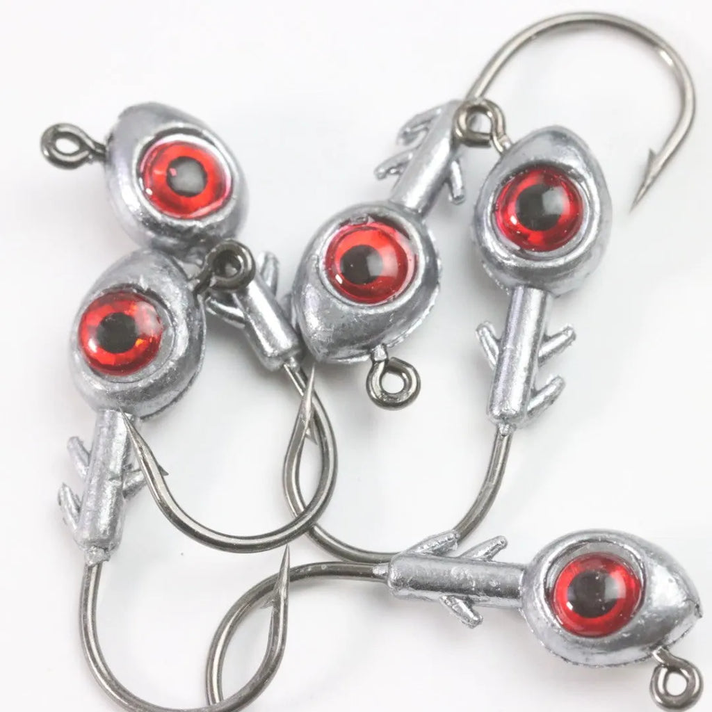 Cambrian Big Eye Fish Head Jig Hook in 10g weight with white eyes on dark background